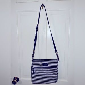 Kate Spade adjustable strap cross body. Black and white stripe. Never worn.